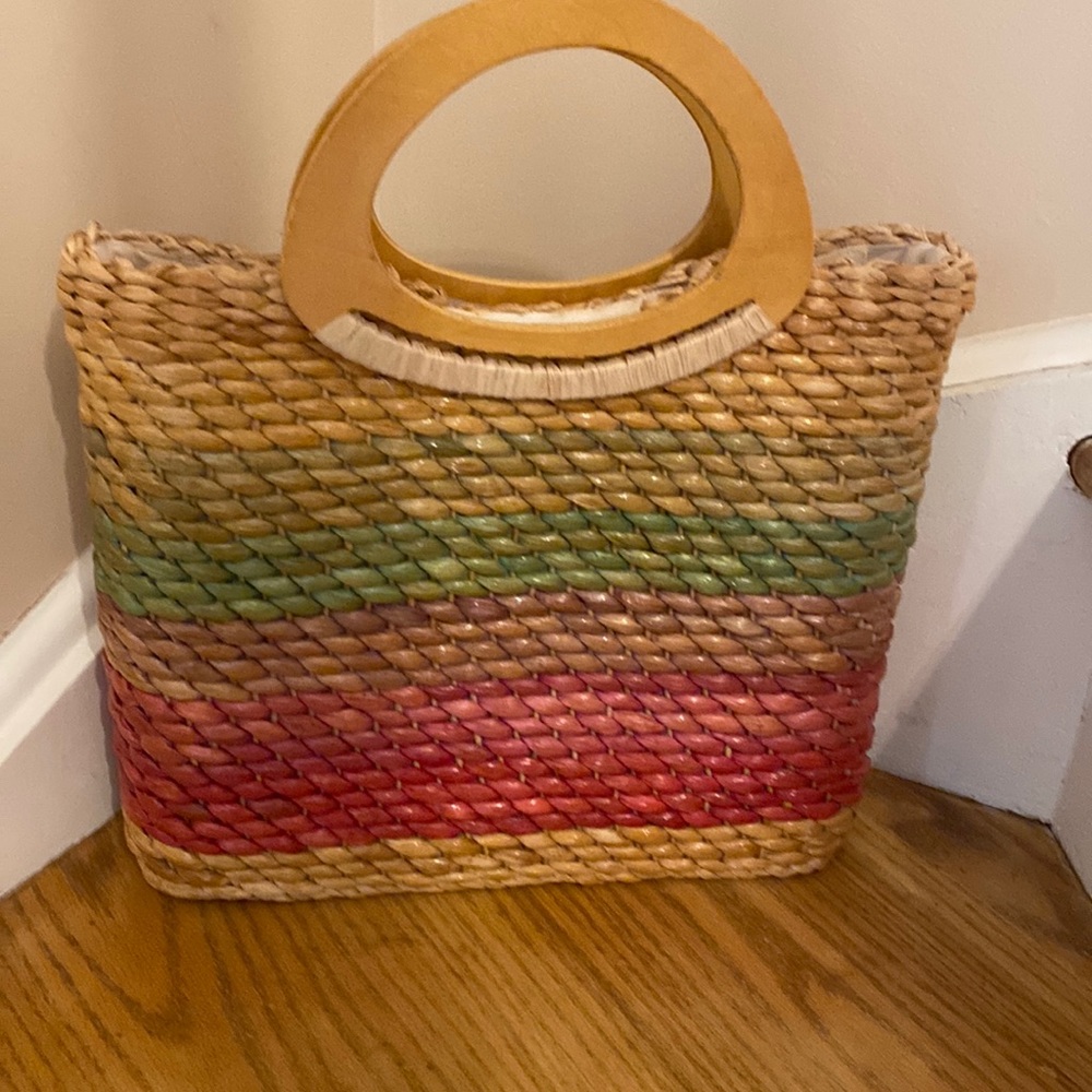 Woven straw rainbow handbag
